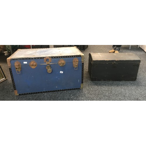 247 - Large blue travelling trunk and an early domed trunk