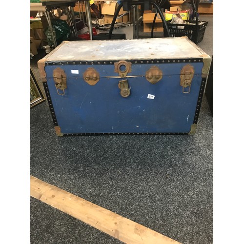 247 - Large blue travelling trunk and an early domed trunk
