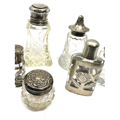 20 - 8 antique silver top bottles