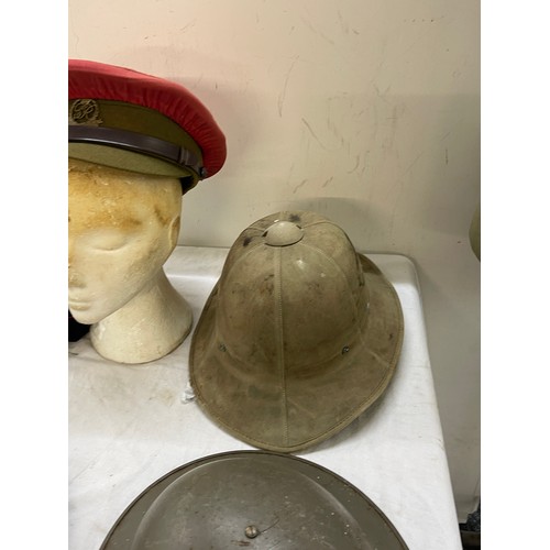 265 - 1942 pith helmet, military police hat, tin helmet and BB hat