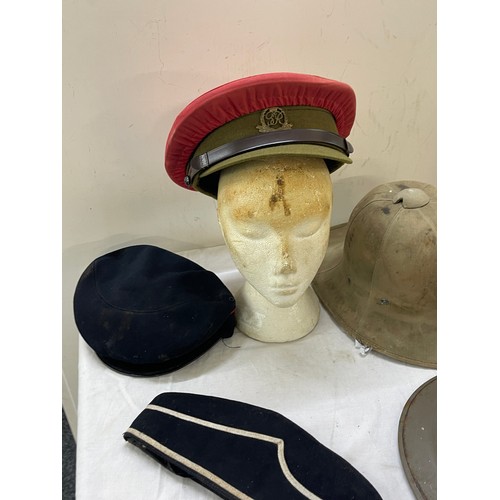 265 - 1942 pith helmet, military police hat, tin helmet and BB hat