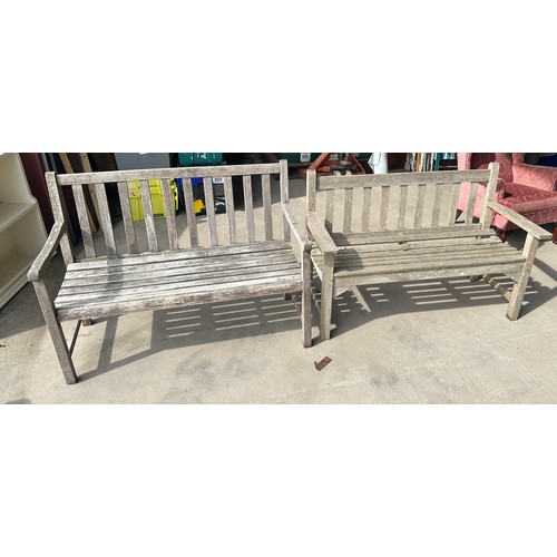 100D - Two wooden garden benches measures 47 inches wide and 35 inches tall