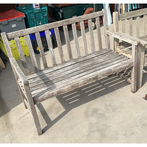 100D - Two wooden garden benches measures 47 inches wide and 35 inches tall