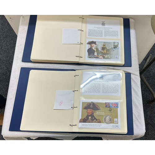 516 - Two stamp albums of ' Battle of Trafalgar' and 22 crowns