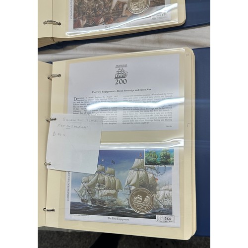 516 - Two stamp albums of ' Battle of Trafalgar' and 22 crowns