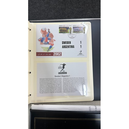 70 - Two stamps albums of football 2002