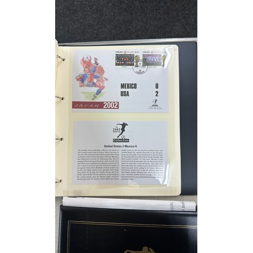 70 - Two stamps albums of football 2002