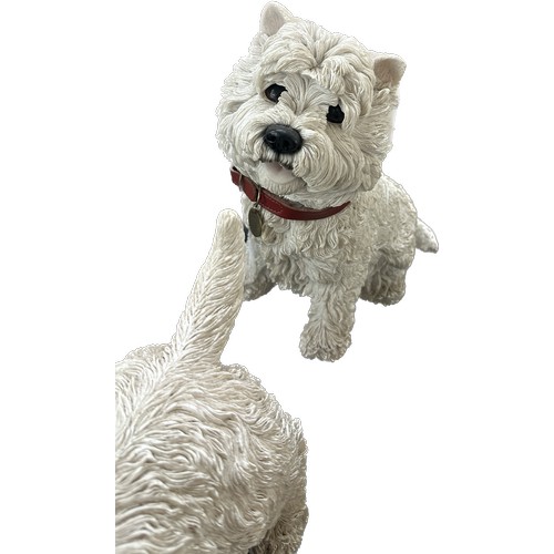 15 - Selection of terrier dog figures largest measures approx 9 inches tall