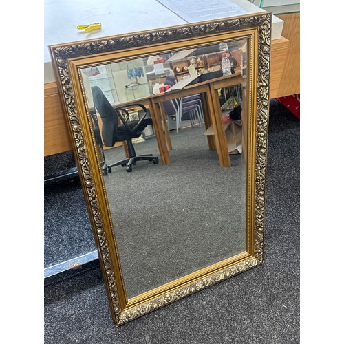 263 - Gilt framed mirror measures approx 35 inches tall by 24 wide