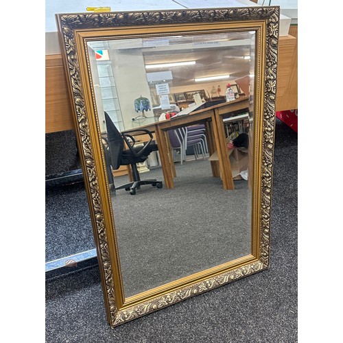 263 - Gilt framed mirror measures approx 35 inches tall by 24 wide