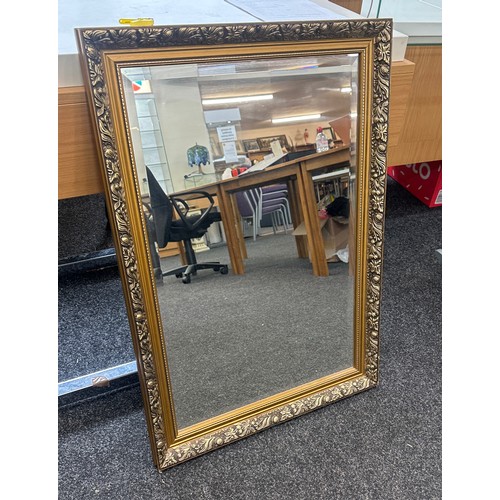 263 - Gilt framed mirror measures approx 35 inches tall by 24 wide