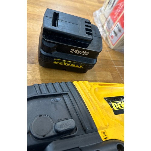 133 - Dewalt drill with charger and three batteries in working order