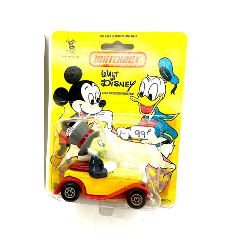 139 - Matchbox Walt Disney Jiminy Cricket, carded in original packaging, Matchbox Walt Disney Pinocchio, c... 