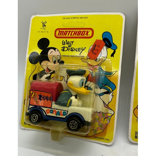 140 - 2 x 1979 Matchbox Walt Disney Donald Duck , carded in original packaging.