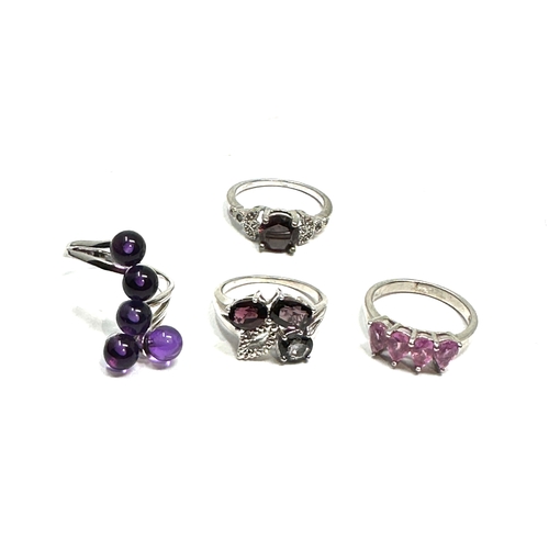 207 - 4 silver gemstone set rings