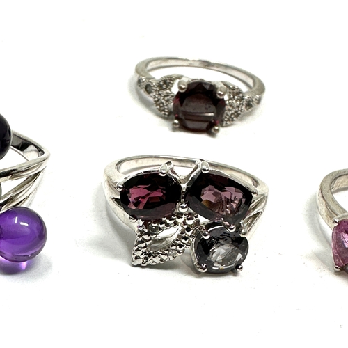 207 - 4 silver gemstone set rings