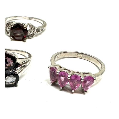 207 - 4 silver gemstone set rings