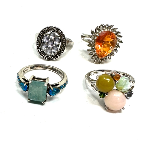 209 - 4 silver gemstone set rings