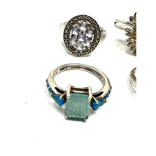 209 - 4 silver gemstone set rings