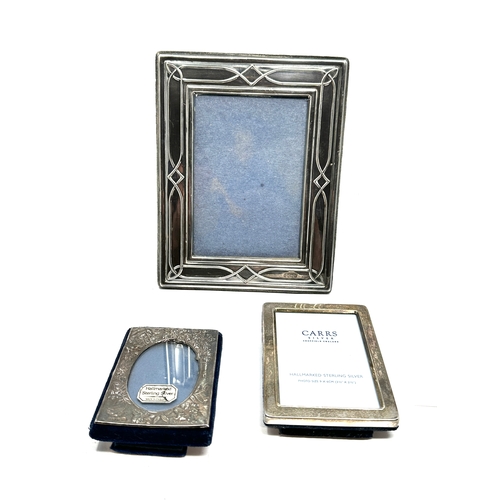 11 - 3 vinatge silver picture frames largest measures approx 18cm by 14cm