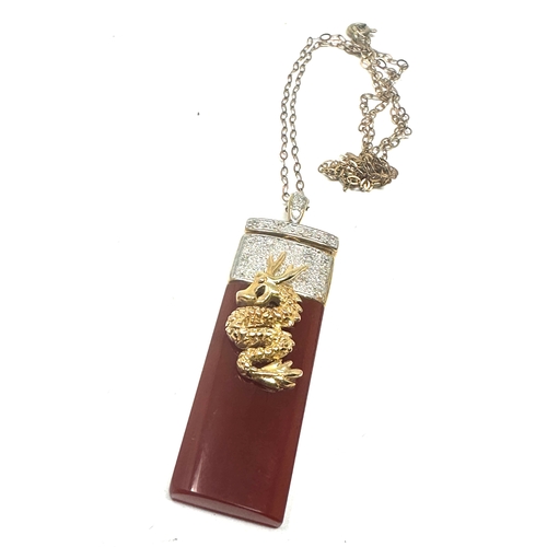 85 - Chinese 14ct Gold Carnelian And Diamond Set  Dragon Detail Pendant On A 9ct Gold Chain weight (7.2g)