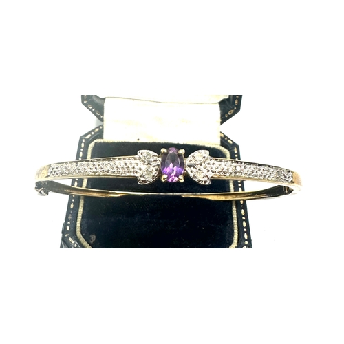 87 - 9ct gold diamond and amethyst hinged bangle bracelet weight 8g