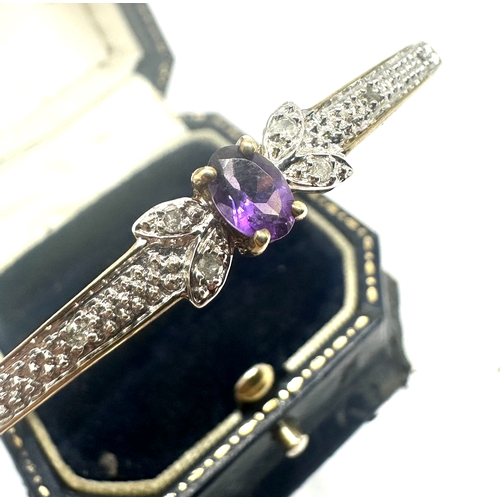 87 - 9ct gold diamond and amethyst hinged bangle bracelet weight 8g