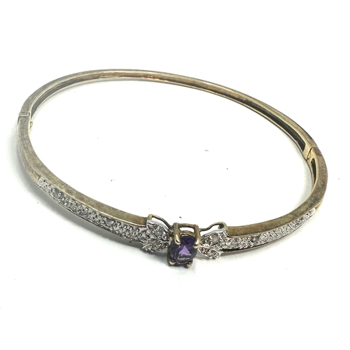 87 - 9ct gold diamond and amethyst hinged bangle bracelet weight 8g