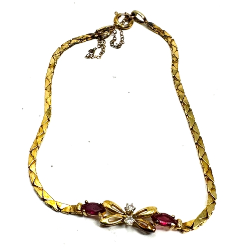 91 - 9ct gold diamond & ruby bracelet weight 4g