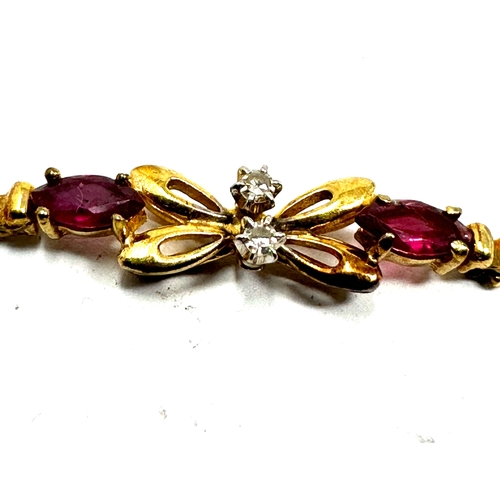 91 - 9ct gold diamond & ruby bracelet weight 4g