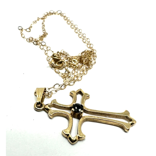 94 - 9ct gold cross pendant necklace set with sapphire weight 1.5g