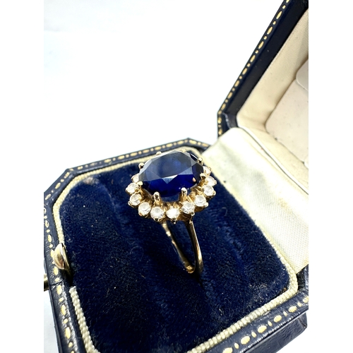 97 - 14ct gold tanzanite & white gemstone ring weight 3.8g