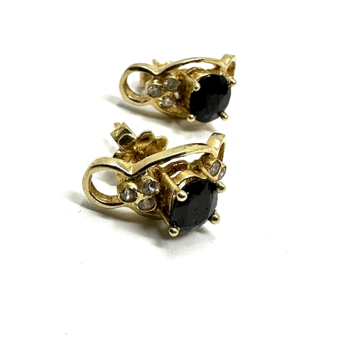 107 - Pair of 14ct gold sapphire & white stone earrings weight 2.9g