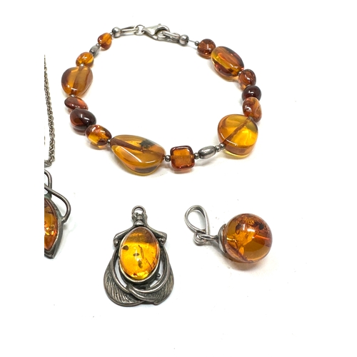 212 - selection of silver & amber jewellery