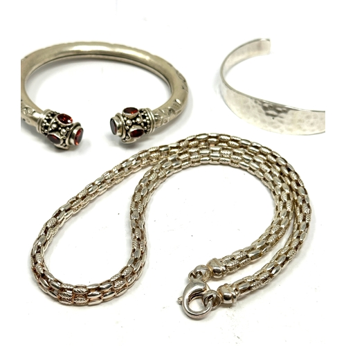 219 - 3 vintage silver items of jewellery inc 2 bangles 7 necklace weight 60g bangle missing stone