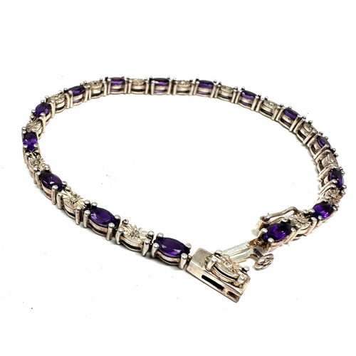 234 - Silver amethyst & diamond tennis bracelet