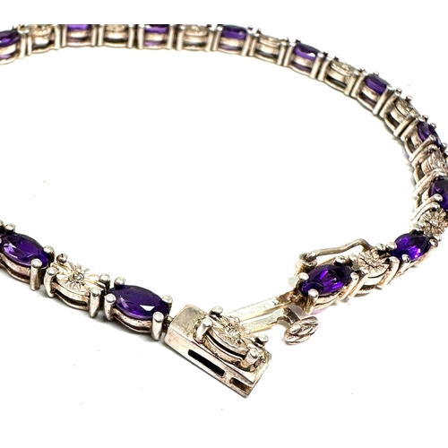 234 - Silver amethyst & diamond tennis bracelet