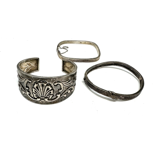 239 - 3 vintage silver bangles weight 65g