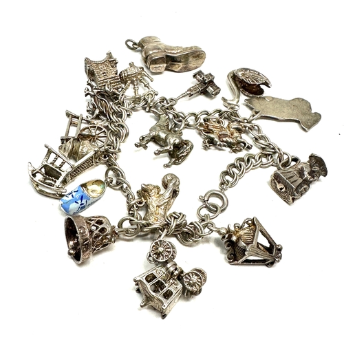 242 - Vintage silver charm bracelet weight 51g