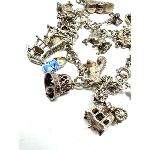 242 - Vintage silver charm bracelet weight 51g