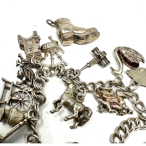 242 - Vintage silver charm bracelet weight 51g