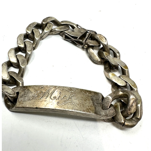 245 - Heavy vintage chunky curb link i.d bracelet engraved mick weight 77g