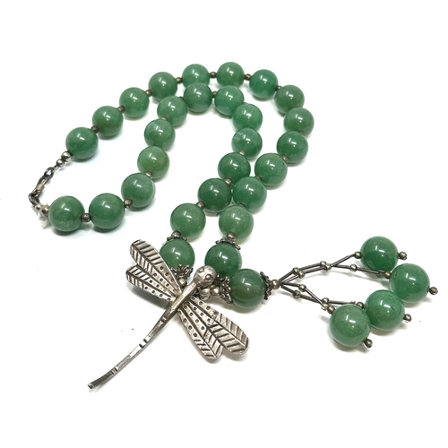 331 - jadeite bead necklace with white metal dragon drop m dia beads measure approx 12m weight 98g