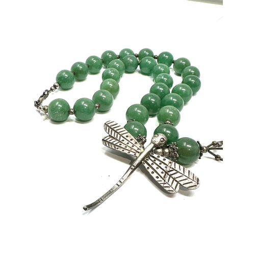 331 - jadeite bead necklace with white metal dragon drop m dia beads measure approx 12m weight 98g