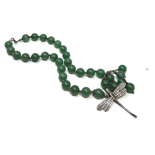 331 - jadeite bead necklace with white metal dragon drop m dia beads measure approx 12m weight 98g