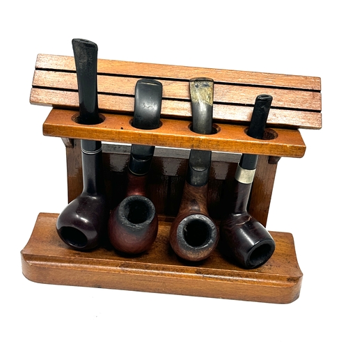 454 - selection of vintage pipes in wooden stand inc medico nova tar gard etc