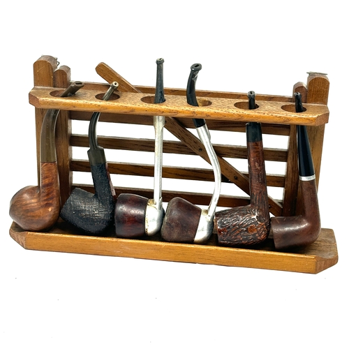 455 - selection of vintage pipes in wooden stand