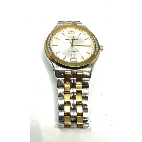 431 - Michael Hill diamond gents quartz wristwatch the bezel is set with diamonds each side untested