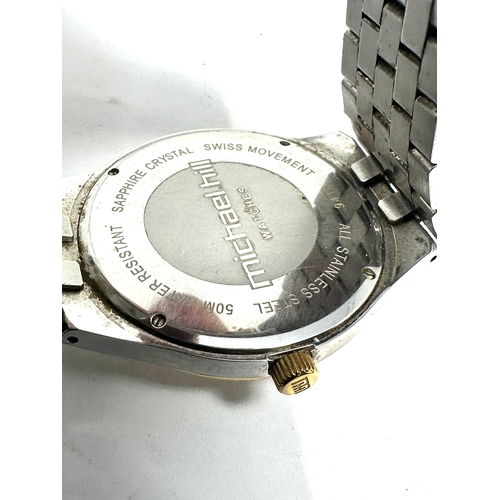 431 - Michael Hill diamond gents quartz wristwatch the bezel is set with diamonds each side untested