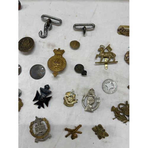 537 - Selection of military army naval badges and insignia